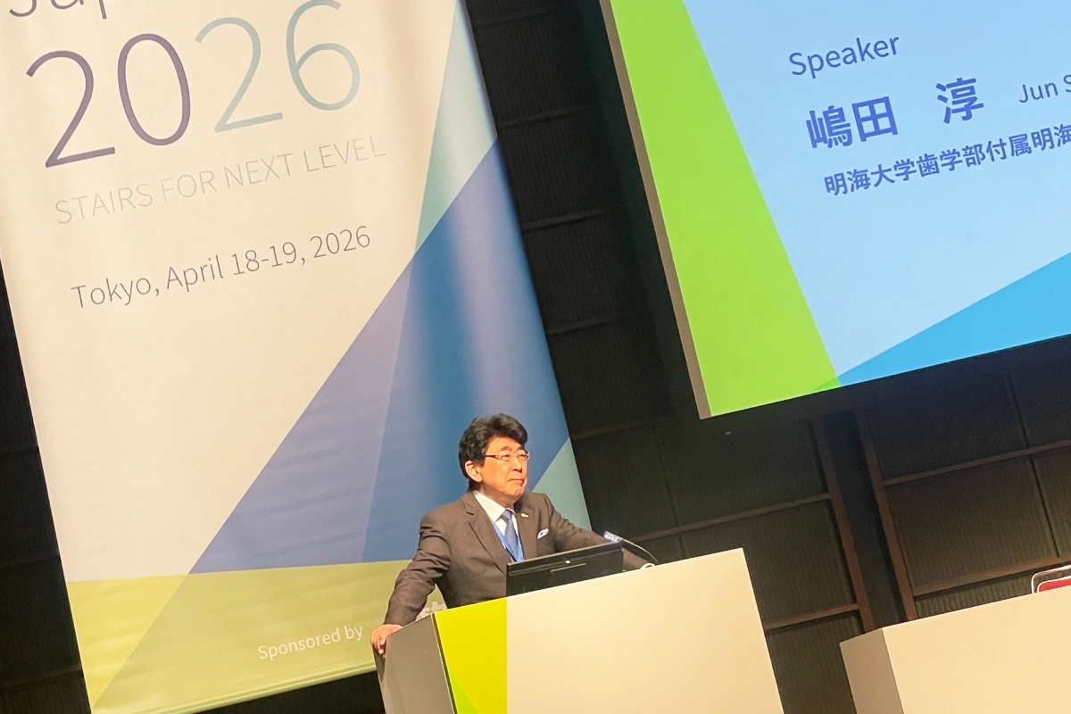 ITI Congress Japan / Straumann FORUM 2026（2026年4月・東京）のランチョンセミナーで、前歯部の抜歯即時埋入について講演する顧問歯科医師・嶋田 淳。